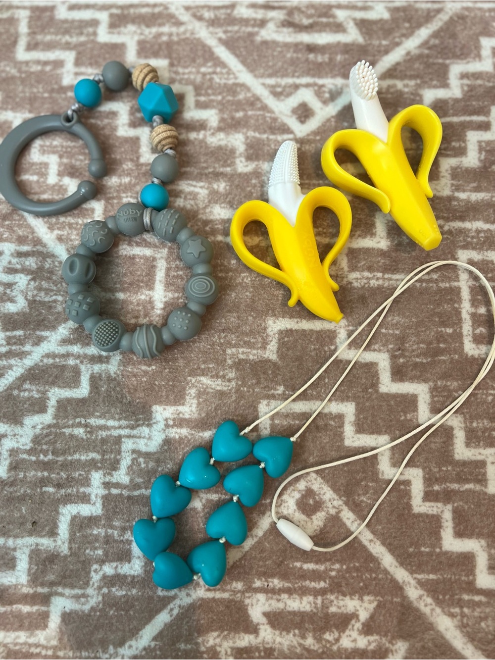 Nuby teething ring, necklace, Yellow Banana Silicone Finger Toothbrush for Kids